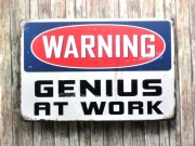Blechschild *Genius at Work*